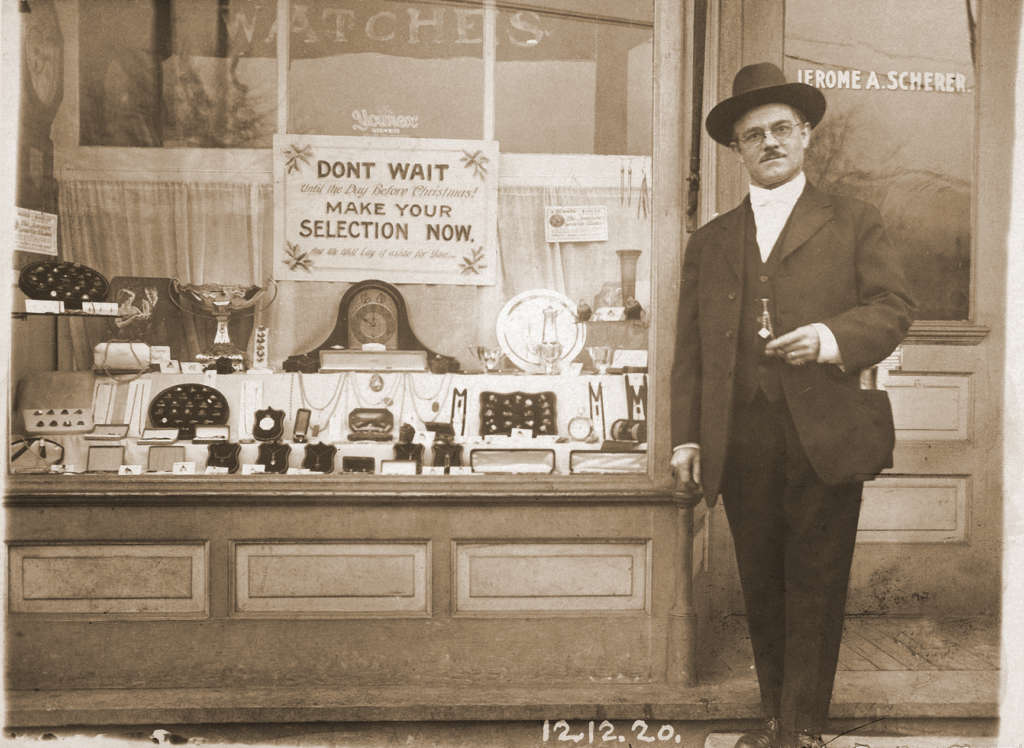 Founder stands in front of Scherer's Jewelers new store on Filmore Ave
