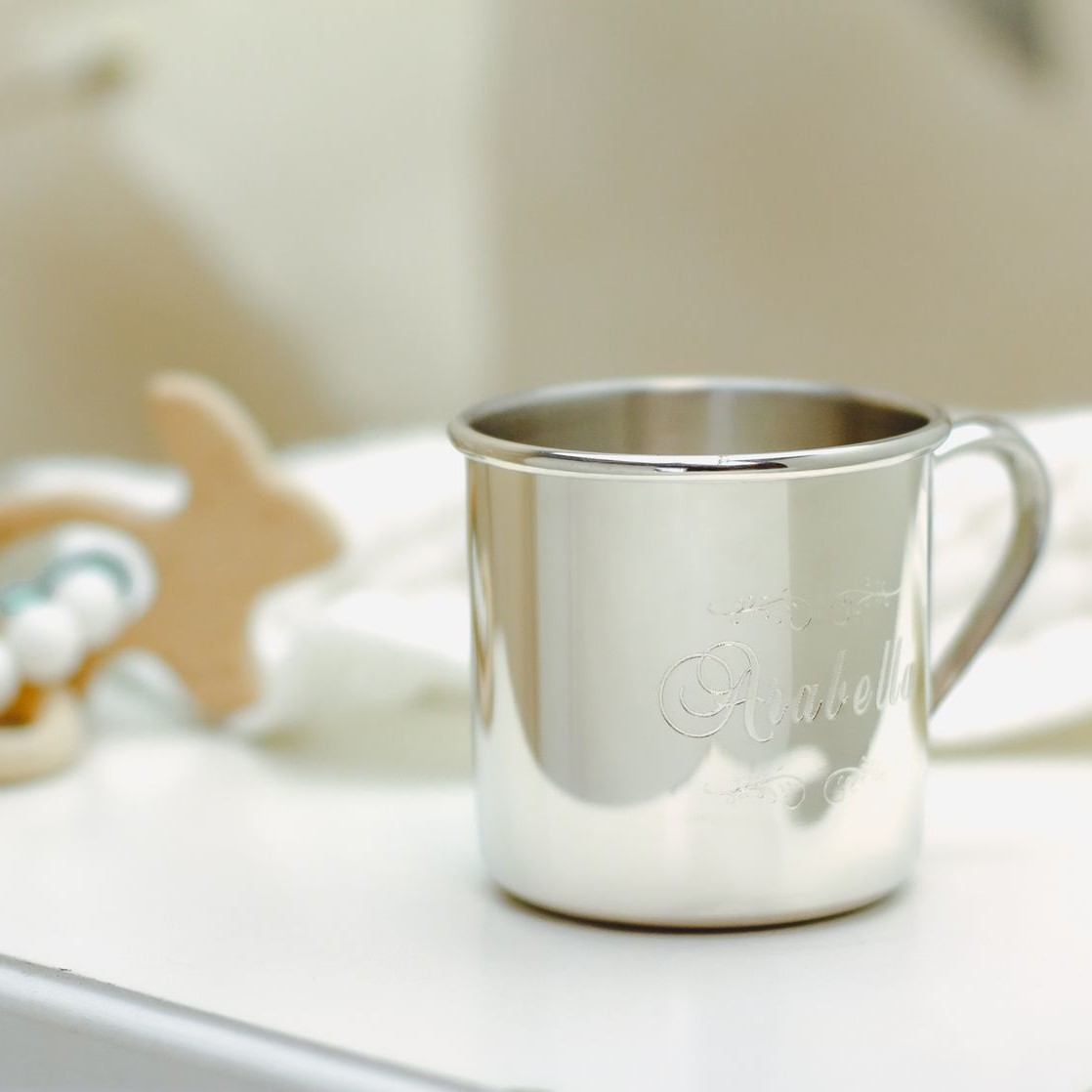 sterling silver baby cup and wooden rattle