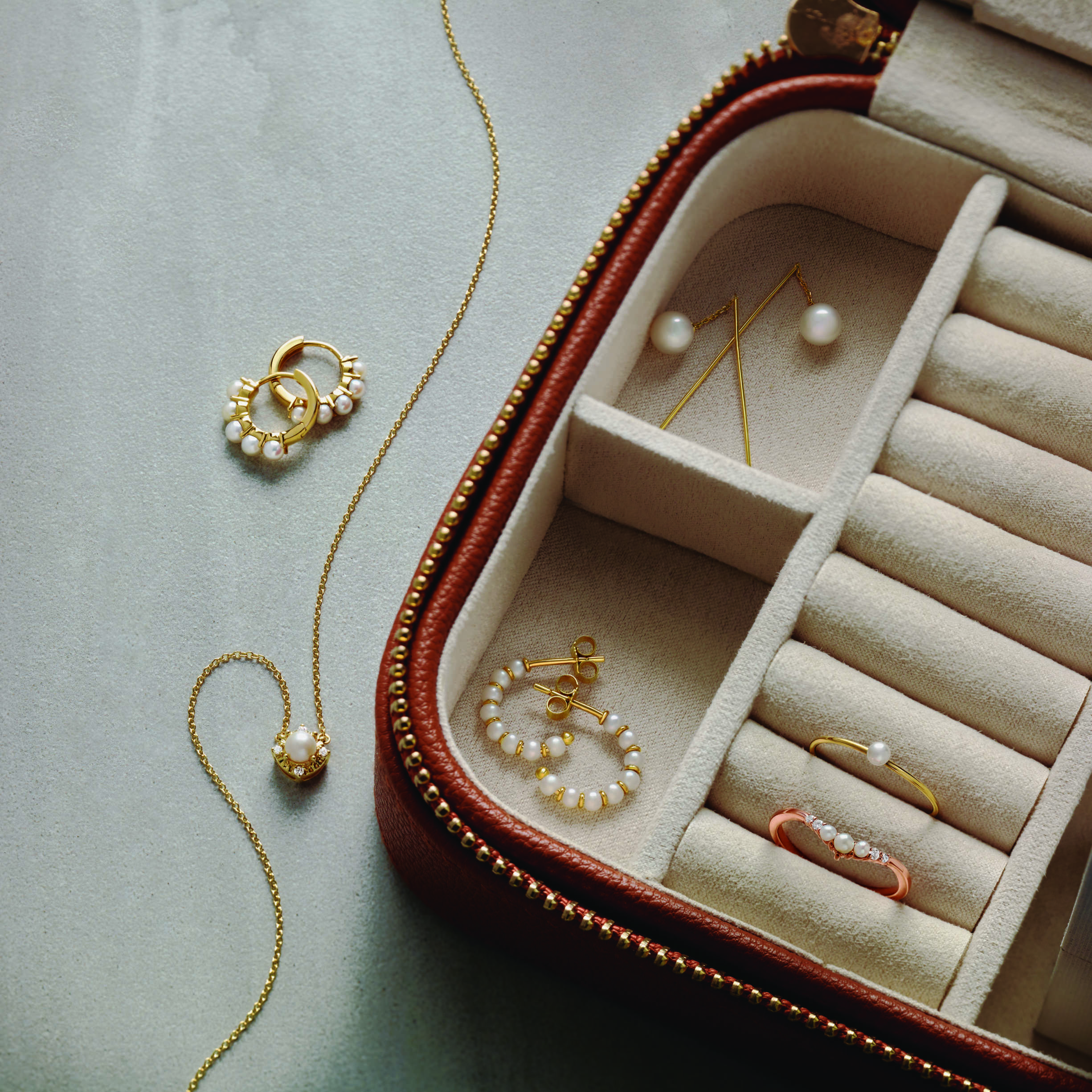 pearl and gold jewelry in jewelrybox