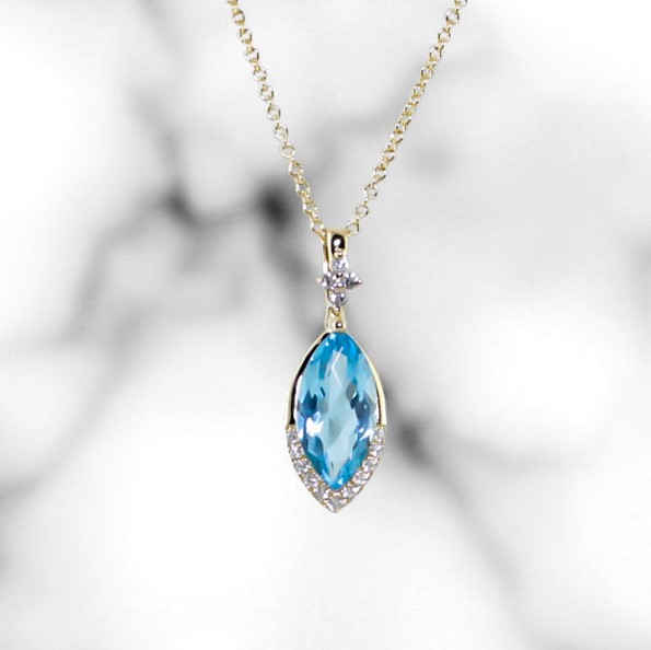 Yellow Gold Marquise Blue Topaz Pendant